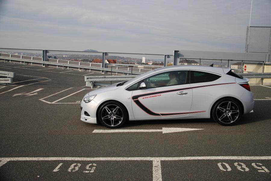  Opel Astra GTC by Steinmetz 2011 года  (фото 13 из 15)